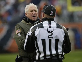 Chicago Bears head coach John Fox argues a call with line judge Bart Longson (2) during the first half of an NFL football game against the Green Bay Packers, Sunday, Nov. 12, 2017, in Chicago. (AP Photo/Nam Y. Huh)