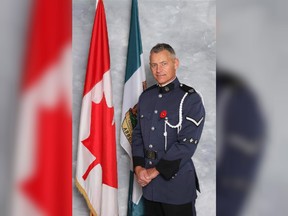 Const. John Davidson died after responding to a report of a possible stolen vehicle Monday in Abbotsford, B.C.