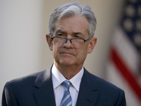 Federal Reserve board member Jerome Powell stands as President Donald Trump announces him as his nominee for the next chair of the Federal Reserve in the Rose Garden of the White House in Washington, Thursday, Nov. 2, 2017. (AP Photo/Alex Brandon)