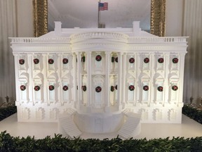 The gingerbread White House is seen in the East Dining Room during a media preview of the 2017 holiday decorations at the White House in Washington, Monday, Nov. 27, 2017. (AP Photo/Carolyn Kaster)
