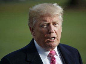 President Donald Trump speaks to reporters before leaving the White House, Tuesday, Nov. 21, 2017, in Washington for a Thanksgiving trip to Mar-a-Lago estate in Palm Beach, Fla. (AP Photo/Evan Vucci)