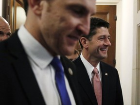House Speaker Paul Ryan of Wis., right, leaves a GOP conference on taxes, Thursday, Nov. 2, 2017, on Capitol Hill in Washington. (AP Photo/Jacquelyn Martin)