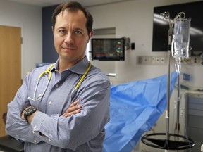 In this Tuesday, Oct. 17, 2017, photo, Dr. Jesse Pines poses for a portrait at the George Washington University School of Medicine & Health Sciences Clinical Learning and Simulation Skills (CLASS) Center in Washington. Pines teaches emergency medicine at the school and also does a rotation in the hospital's emergency room. A push by the insurer Anthem to limit ER visits to true emergencies worries doctors and patients who question whether they will make the right call or get stuck with a bill. "I think it's completely unfair to patients," said Pines. "It runs the risk of really hurting some people." (AP Photo/Jacquelyn Martin)
