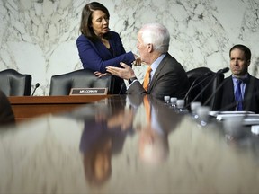 Sen. Maria Cantwell, D-Wash., and Sen. John Cornyn, R-Texas, talk before the start of panel of the Senate Finance Committee begins work on overhauling the nation's tax code, on Capitol Hill in Washington, Monday, Nov. 13, 2017. The legislation in the House and Senate carries high political stakes for President Donald Trump and Republican leaders in Congress, who view passage of tax cuts as critical to the GOP's success at the polls next year. (AP Photo/Pablo Martinez Monsivais)