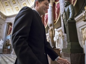 House Speaker Paul Ryan, R-Wis., walks through Statuary Hall to his office on Capitol Hill in Washington, Friday, Nov. 3, 2017. Ryan introduced a far-reaching tax overhaul Thursday that will be a priority for the GOP. (AP Photo/J. Scott Applewhite)