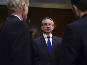 Paulino do Rego Barros, Jr., Interim Chief Executive Officer of Equifax, Inc., arrives to testify before the Senate Commerce Committee on Capitol Hill in Washington, Wednesday, Nov. 8, 2017, during a hearing on "Protecting Consumers in the Era of Major Data Breaches" after the 2013 data breach at Yahoo! that affected 3 billion user accounts and another earlier this year at Equifax that hit around 145 million. (AP Photo/Susan Walsh)