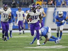 Minnesota Vikings running back Latavius Murray (25) breaks downfield during the second half of an NFL football game against the Detroit Lions, Thursday, Nov. 23, 2017, in Detroit. (AP Photo/Rick Osentoski)