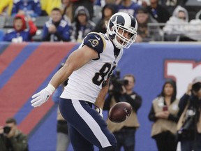 Los Angeles Rams tight end Tyler Higbee celebrates after catching a pass for a touchdown during the first half of an NFL football game against the New York Giants, Sunday, Nov. 5, 2017, in East Rutherford, N.J. (AP Photo/Julio Cortez)