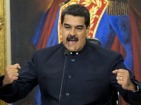In this Oct. 17, 2017 photo, Venezuela's President Nicolas Maduro speaks during a press conference at the Miraflores presidential palace, in Caracas, Venezuela.