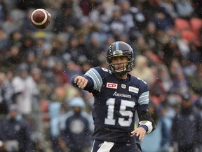 Toronto Argonauts quarterback Ricky Ray fires a pass as snow falls during the East Division final on Nov. 19.