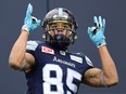 Toronto Argonauts wide receiver DeVier Posey celebrates his touchdown against the Saskatchewan Roughriders in the East Division final on Nov. 19.