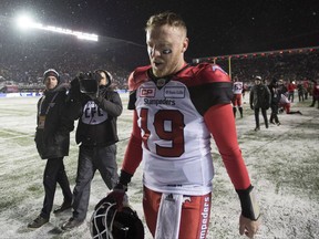 Calgary Stampeders quarterback Bo Levi Mitchell leaves the field after losing the Grey Cup on Nov. 26.