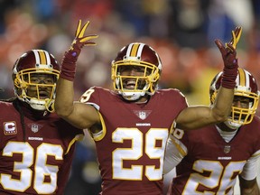 Washington Redskins cornerback Kendall Fuller (29) celebrates his game ending interception of a pass intended for New York Giants wide receiver Travis Rudolph during the second half of an NFL football game against in Landover, Md., Thursday, Nov. 23, 2017. The Redskins defeated the Giants 20-10. (AP Photo/Nick Wass)