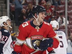 Florida Panthers defenseman Mark Pysyk (13) celebrates his goal against the Columbus Blue Jackets during the first period of an NHL hockey game, Thursday, Nov. 2, 2017, in Sunrise, Fla. (AP Photo/Joel Auerbach)