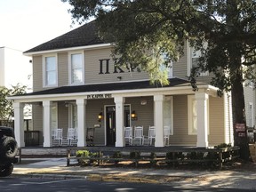 The Pi Kappa Phi fraternity house is seen near Florida State University in Tallahassee, Fla., Tuesday, Nov. 7, 2017. University President John Thrasher announced the indefinite suspension of the school's 55 fraternities and sororities following the death of a freshman pledge.   Andrew Coffey, a pledge at Pi Kappa Phi, died Friday after he was found unresponsive following a party. (AP Photo/Joseph Reedy)