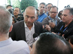 Derek Jeter, chief executive officer and part owner of the Miami Marlins, talks with members of the media at the annual MLB baseball general managers' meetings, Wednesday, Nov. 15, 2017, in Orlando, Fla. (AP Photo/John Raoux)