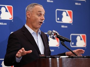 Major League Baseball commissioner Rob Manfred delivers remarks during a news conference at the annual MLB baseball owners meetings, Thursday, Nov. 16, 2017, in Orlando, Fla. (AP Photo/John Raoux)