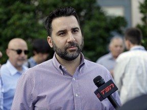 New Atlanta Braves general manager Alex Anthopoulos talks with members of the media at the annual MLB baseball general managers' meetings, Tuesday, Nov. 14, 2017, in Orlando, Fla. (AP Photo/John Raoux)