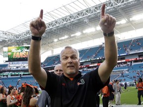 Miami head coach Mark Richt walks off the field after an NCAA college football game against Virginia, Saturday, Nov. 18, 2017, in Miami Gardens, Fla. Miami won 44-28. (AP Photo/Lynne Sladky)