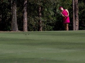 LPGA Tour pro Lexi Thompson hits on the seventh hole during the third round of the CME Group Tour Championship at Tiburón Golf Club Saturday, Nov. 18, 2017 in Naples, Fla. Thompson would finish the day with a score of nine-under par. (Luke Franke/Naples Daily News via AP)