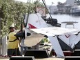 The remains of an ICON A5 ultralight airplane are moved from a boat ramp in the Gulf Harbors neighbourhood of New Port Richey, Fla., on Wednesday, Nov. 8, 2017.  The private plane, which belonged to Roy Halladay had just been removed from the shallow waters off Ben Pilot Point where it crashed Tuesday, killing the 40-year-old former Toronto Blue Jays pitcher.