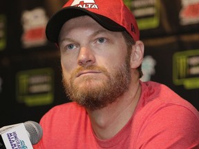 Dale Earnhardt Jr. speaks with the media during a news conference before Sunday's NASCAR Cup Series auto race at Homestead-Miami Speedway in Homestead, Fla., Friday, Nov. 17, 2017.(AP Photo/Terry Renna)