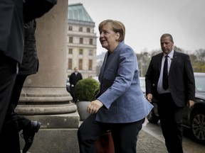 German Chancellor Angela Merkel arrives for the coalition talks between her Christian Democrats, Greens and Free Democratic Party FDP in Berlin Wednesday, Nov. 15, 2017. (Kay Nietfeld/dpa via AP)