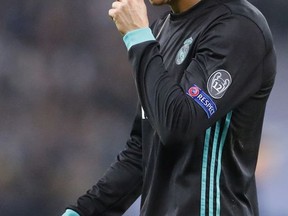 Real Madrid's Cristiano Ronaldo reacts after Tottenham scored their third goal during the soccer Champions League group H match between Tottenham and Real Madrid in London, Wednesday, Nov. 1, 2017. (AP Photo/Frank Augstein)