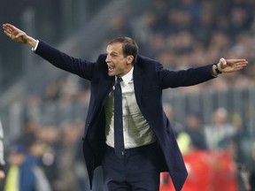 Juventus coach Massimiliano Allegri gestures during the Champions League group D soccer match between Juventus and Barcelona, at the Allianz Stadium in Turin, Italy, Wednesday, Nov. 22, 2017. (AP Photo/Antonio Calanni)