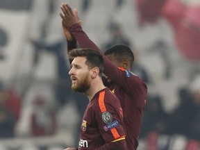 Barcelona's Lionel Messi walks off the pitch at the end of the Champions League group D soccer match between Juventus and Barcelona, at the Allianz Stadium in Turin, Italy, Wednesday, Nov. 22, 2017. (AP Photo/Antonio Calanni)