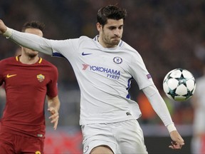 Chelsea's Alvaro Morata goes for the ball during the Champions League group C soccer match between Roma and Chelsea, at the Olympic stadium in Rome, Tuesday, Oct. 31, 2017. (AP Photo/Andrew Medichini)