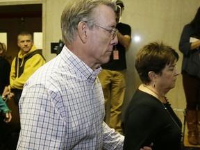 Jim Steinle and Liz Sullivan, right, the parents of Kate Steinle, walk to a court room for closing arguments in the trial of Jose Ines Garcia Zarate accused of killing their daughter, on Monday, Nov. 20, 2017, in San Francisco. Jose Ines Garcia Zarate had been deported five times and was wanted for a sixth deportation when Kate Steinle was fatally shot in the back while walking with her father on the pier. (AP Photo/Eric Risberg)