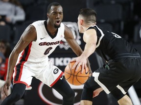 Georgia guard William Jackson (0) defends against South Carolina Upstate guard Jure Span (3) in the first half of an NCAA college basketball game in Athens, Ga., Tuesday, Nov. 14, 2017. (Joshua L. Jones/Athens Banner-Herald via AP)