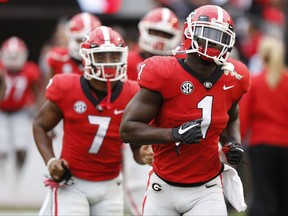 Georgia tailback Sony Michel (1) heads out to the field just before the start of a NCAA college football game against Kentucky in Athens, Ga., Saturday, Nov. 18, 2017. (Joshua L. Jones/Athens Banner-Herald via AP)