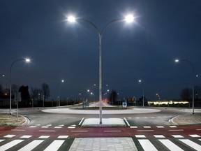 A roundabout illuminated by LED lights.