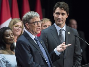 Billionaire philanthropist Bill Gates responds to a question during a news conference with Prime Minister Justin Trudeau at the Global Fund conference Saturday, September 17, 2016 in Montreal.