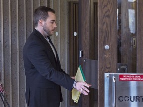 Christopher Calvin Garnier, charged with second-degree murder in the death of Truro police officer Const. Catherine Campbell, arrives at Nova Supreme Court in Halifax on Tuesday, Nov. 21, 2017. The Canadian Press/Andrew Vaughan