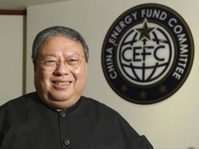 In this July, 2015, photo, Patrick Ho, former Hong Kong home secretary, deputy chairman of an non-governmental organization funded by CEFC China Energy poses during an interview in Hong Kong. The Chinese energy company denies it had anything to do with a multimillion dollar bribery scheme that U.S. prosecutors say was organized by two businessmen to secure business from African officials on its behalf. In a statement late Tuesday, Nov. 21, 2017, CEFC China Energy Co. sought to distance itself from the corruption, money laundering and conspiracy charges filed against Patrick Ho and Cheik Gadio, a former Senegal foreign minister. (AP Photo)