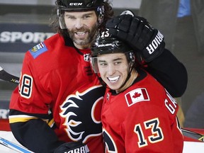 Calgary Flames forward Johnny Gaudreau (right) celebrates a Jaromir Jagr goal on Nov. 9.