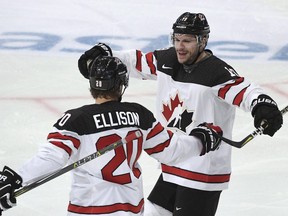 Team Canada forward Gilbert Brule (right) celebrates his goal against Finland at the Karjala Cup with teammate Matt Ellison on Nov. 12.