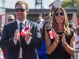 Former Ottawa Senators NHL player Daniel Alfredsson and his wife Bibi clap during a citizenship ceremony for the World Cup of Hockey 2016 Legacy Project in 2016.