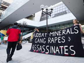 Protesters demonstrate outside a Hudbay Minerals annual general meeting in Toronto on June 14, 2012. Hudbay is facing three lawsuits that allege the company was negligent in failing to prevent security personnel from carrying out acts of violence.