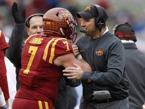 Iowa State quarterback Joel Lanning (7) celebrates with head coach Matt Campbell, right, after scoring on a 1-yard touchdown run during the first half of an NCAA college football game against Oklahoma State, Saturday, Nov. 11, 2017, in Ames, Iowa. (AP Photo/Charlie Neibergall)