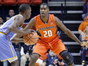 Illinois guard Da'Monte Williams (20) defends against Southern University guard Torrey Mayo (13) during the first half of an NCAA college basketball game at the State Farm Center, Friday, Nov. 10, 2017, in Champaign, Ill. (AP Photo/Stephen Haas)