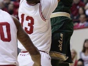 Indiana Hoosiers forward Juwan Morgan (13) defends South Florida Bulls center Nikola Scekic (41) as he loses the ball shooting during the Indiana South Florida NCAA men's college basketball game at Simon Skjodt Assembly Hall in Bloomington, Ind., Sunday, Nov. 19, 2017. (Chris Howell/The Herald-Times via AP)