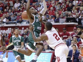 Indiana guard Josh Newkirk (2) fouls Eastern Michigan guard Paul Jackson (3) during an NCAA college basketball game in Bloomington, Ind., Friday, Nov. 24, 2017. (Chris Howell/The Herald-Times via AP)
