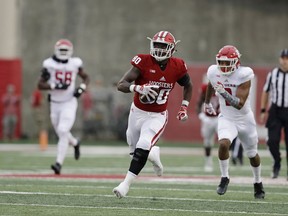 Indiana's Ian Thomas (80) runs for a 57-yard touchdown reception during the first half of an NCAA college football game against Rutgers, Saturday, Nov. 18, 2017, in Bloomington, Ind. (AP Photo/Darron Cummings)