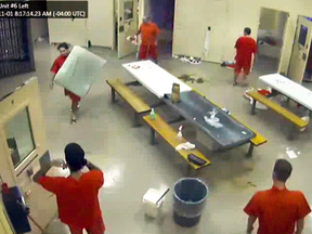 Video grabs from Elgin Middlesex jail show Anthony George cleaning up the morning after Adam Kargus was killed.