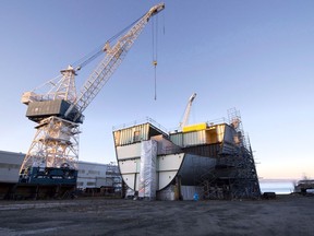 Quebec Premier Philippe Couillard says it is an injustice that Ottawa isn't giving more public contracts to the Davie shipyard near Quebec City, shown in this November, 2012 file photo. THE CANADIAN PRESS/Jacques Boissinot