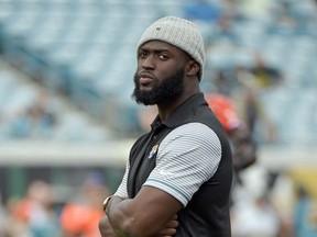 Jacksonville Jaguars running back Leonard Fournette watches players warm up before an NFL football game against the Cincinnati Bengals, Sunday, Nov. 5, 2017, in Jacksonville, Fla. AP Photo/Phelan M. Ebenhack)